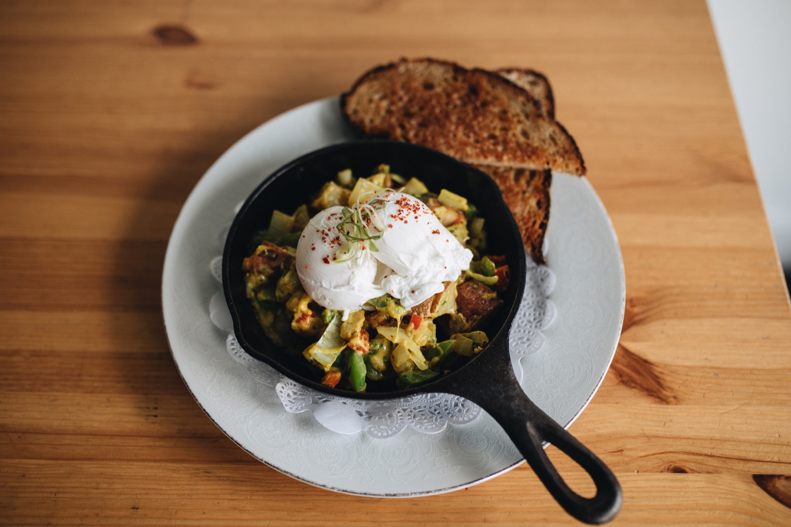 Little Griddle Cafe brunch skillet with poached eggs in Portland Oregon